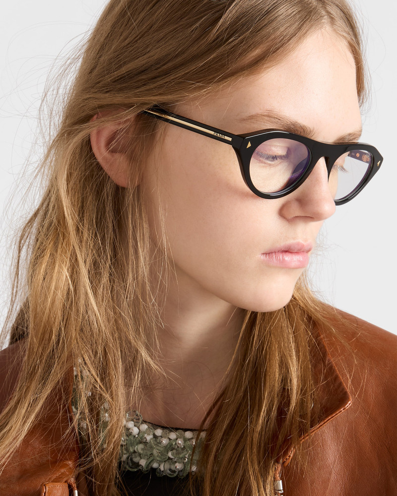 Prada sunglasses with the iconic metal plaque 6