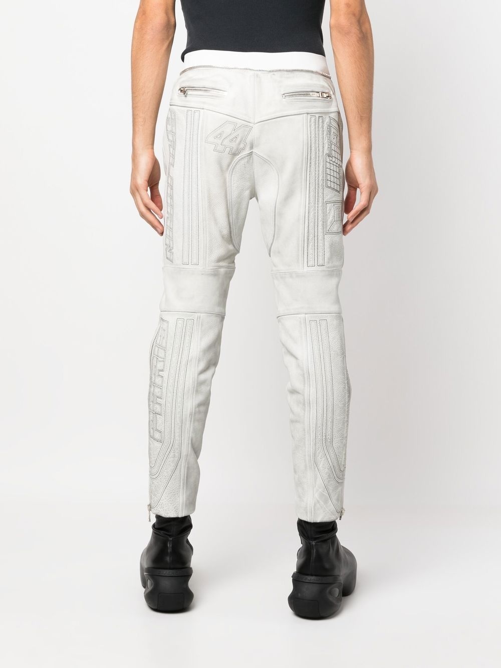 embroidered-design tapered leather trousers - 4