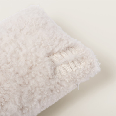 Miu Miu Wool, cashmere and shearling pillow outlook
