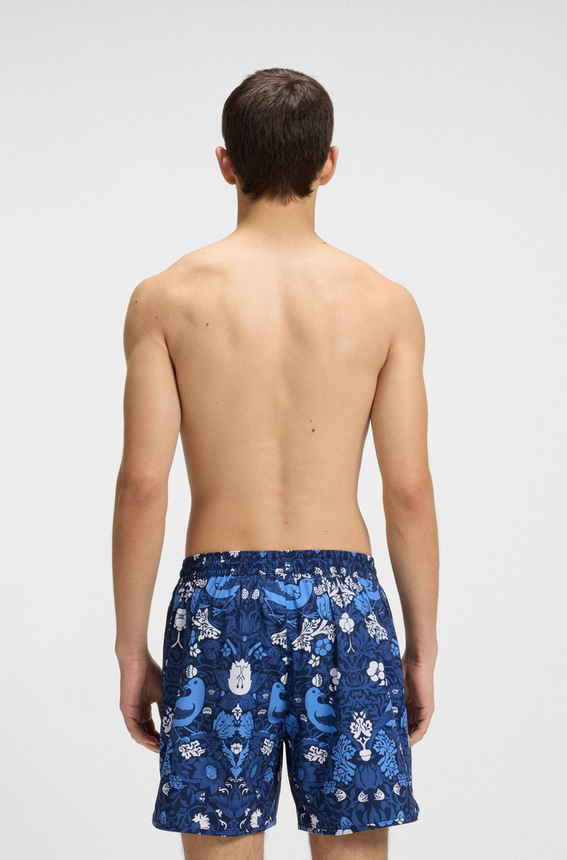 HUGO PRINTED SWIM SHORTS WITH EMBROIDERED LOGO outlook