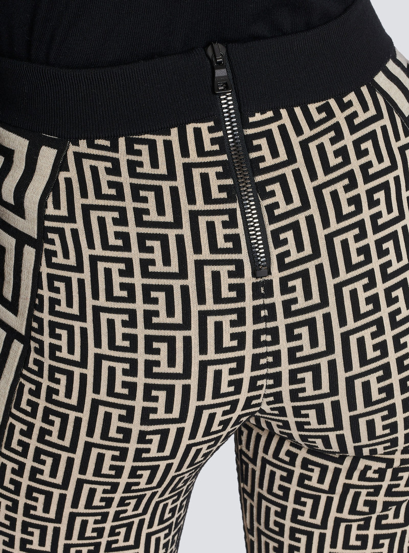Monogrammed fine knit flared trousers 6