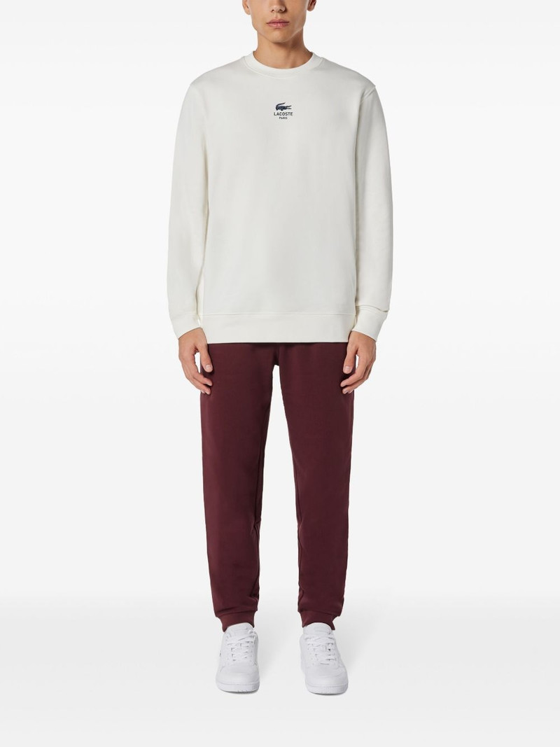 LACOSTE logo-print track pants outlook