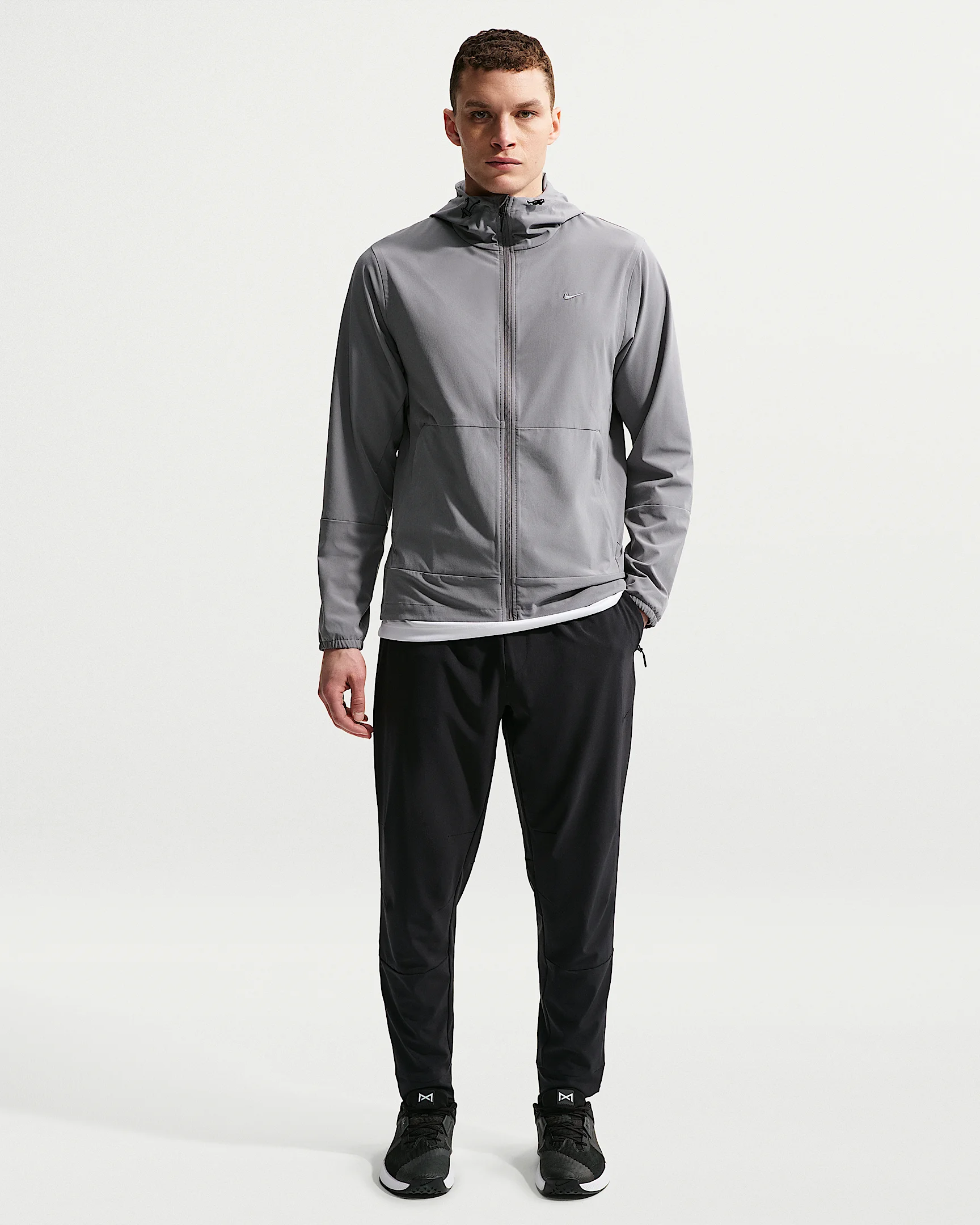 Nike Unlimited Men's Dri-FIT Zippered Cuff Versatile Pants - 1