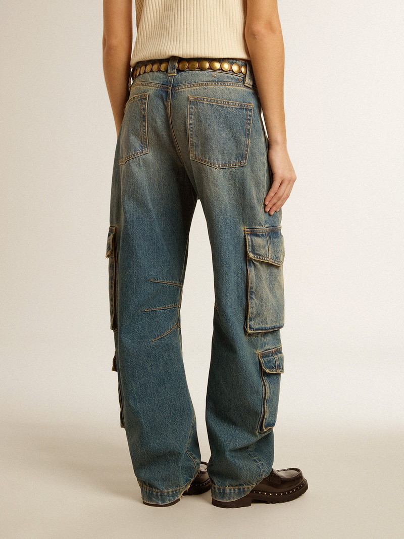 Blue jeans with a distressed finish 4