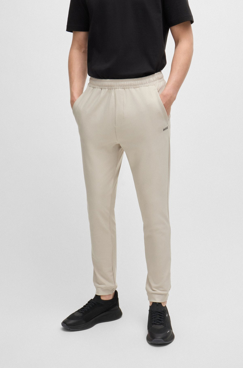 TRACKSUIT BOTTOMS IN STRETCH FABRIC WITH DECORATIVE REFLECTIVE LOGO 2