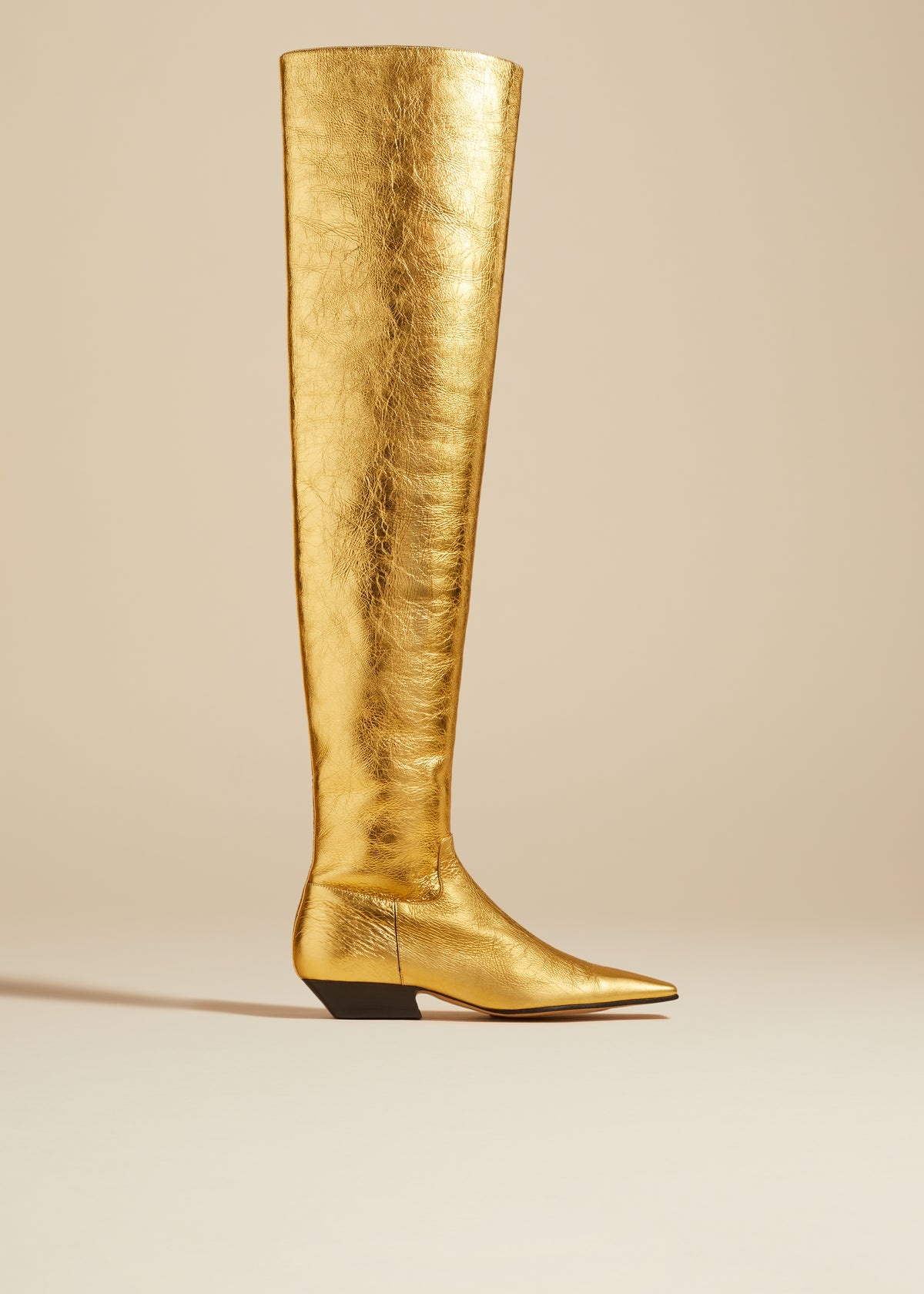The Marfa Over-the-Knee Flat Boot in Gold Metallic Leather - 1