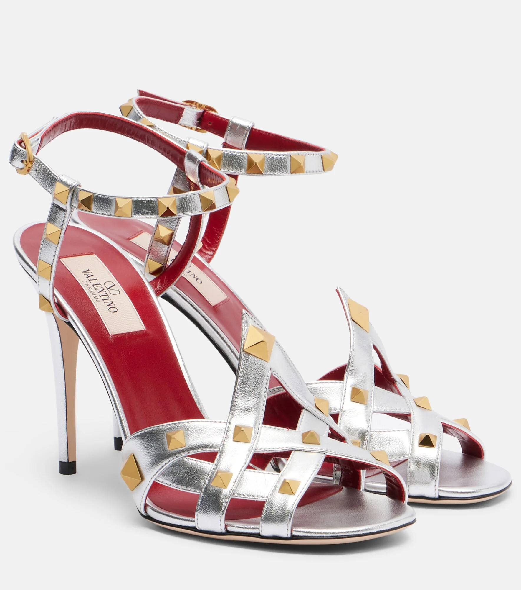 Rockstud metallic leather sandals - 1