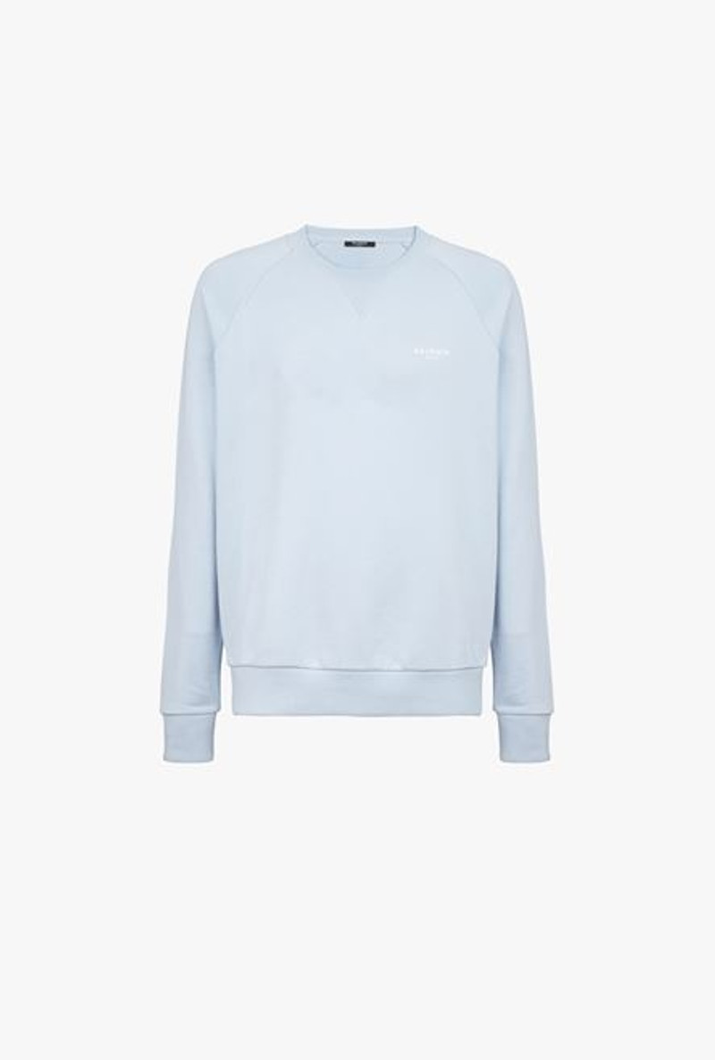 Pale blue eco-designed cotton sweatshirt with small flocked white Balmain Paris logo 1