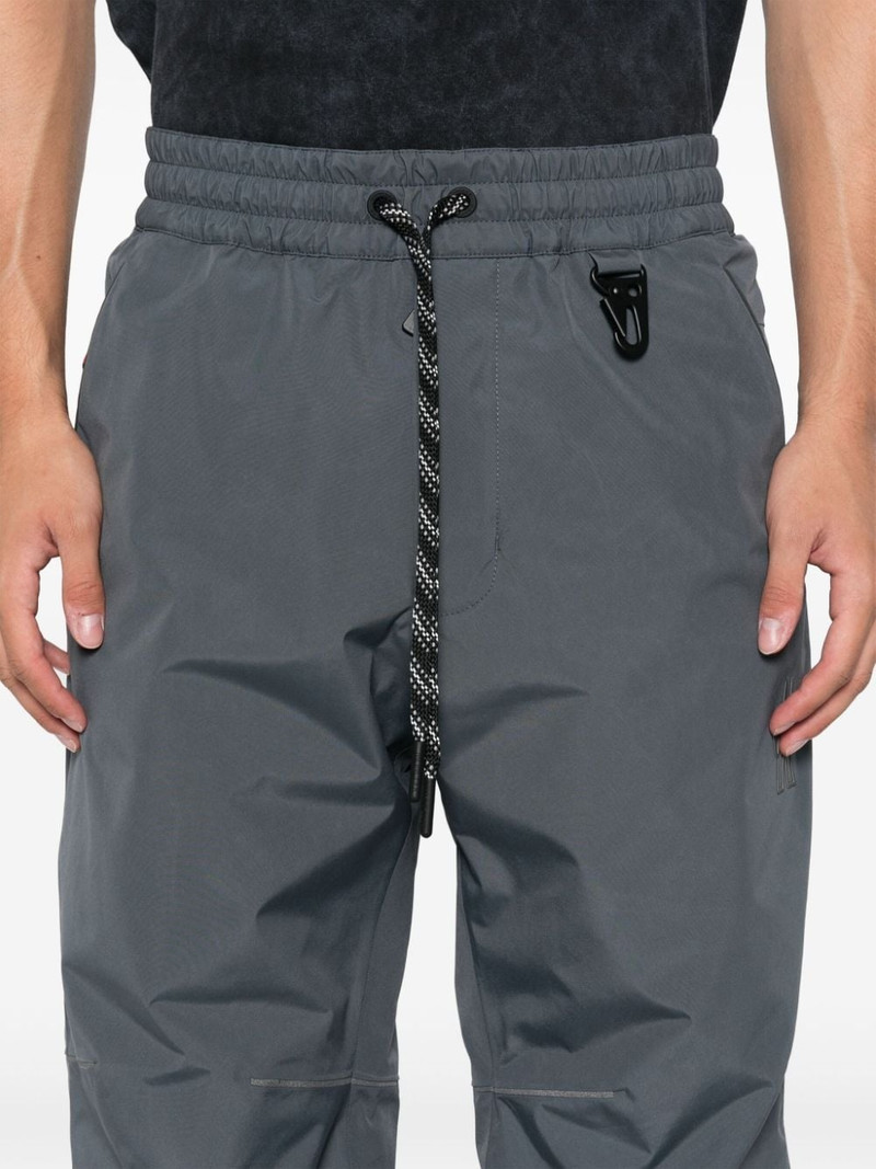 logo-embossed track pants 5