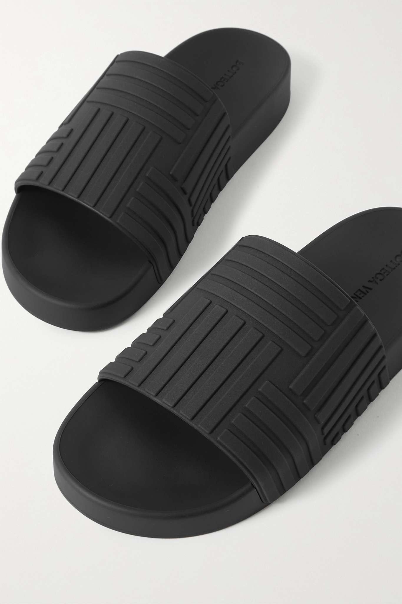 Embossed rubber slides - 4