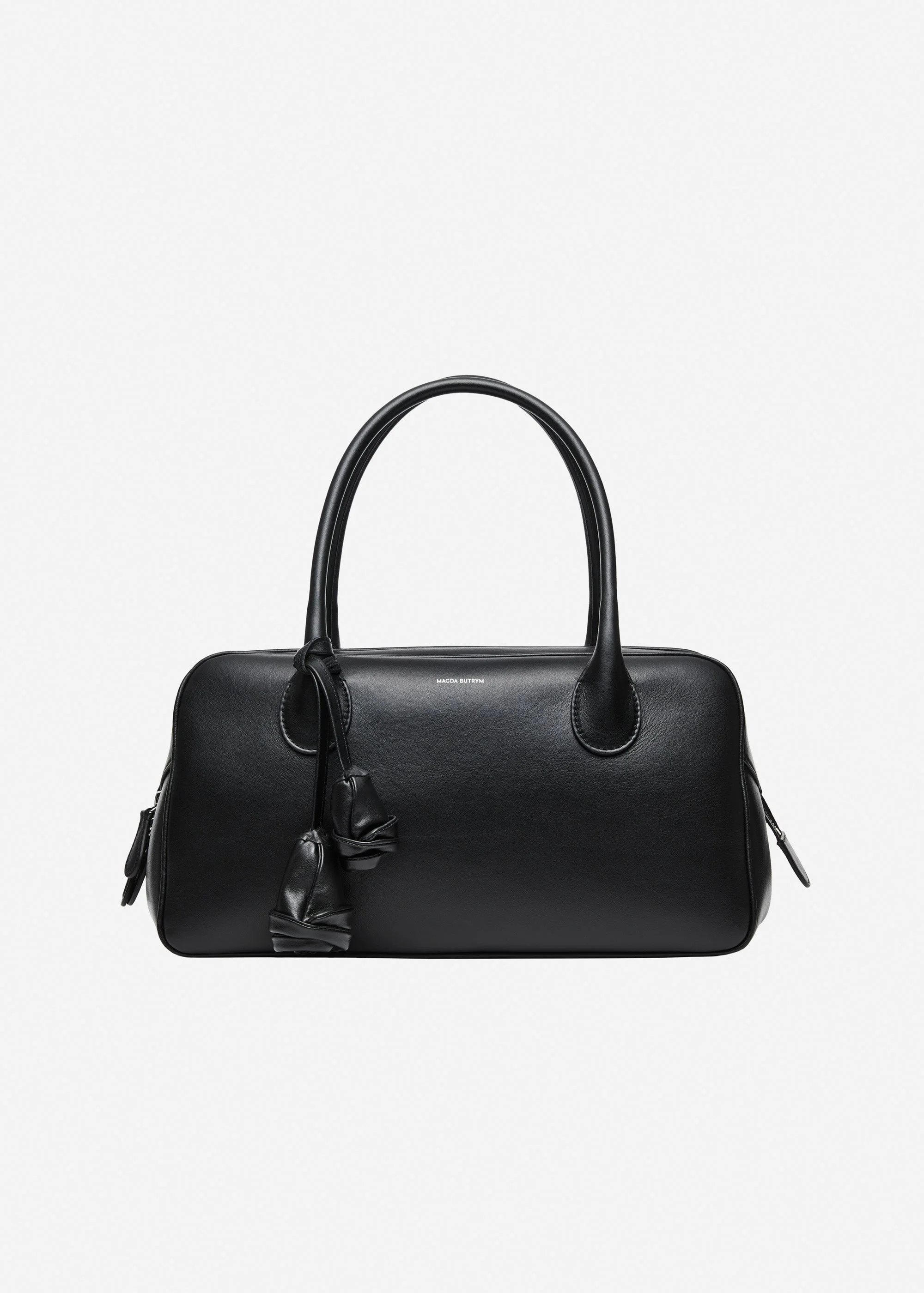 Brigitte in black leather with flower charm - 1