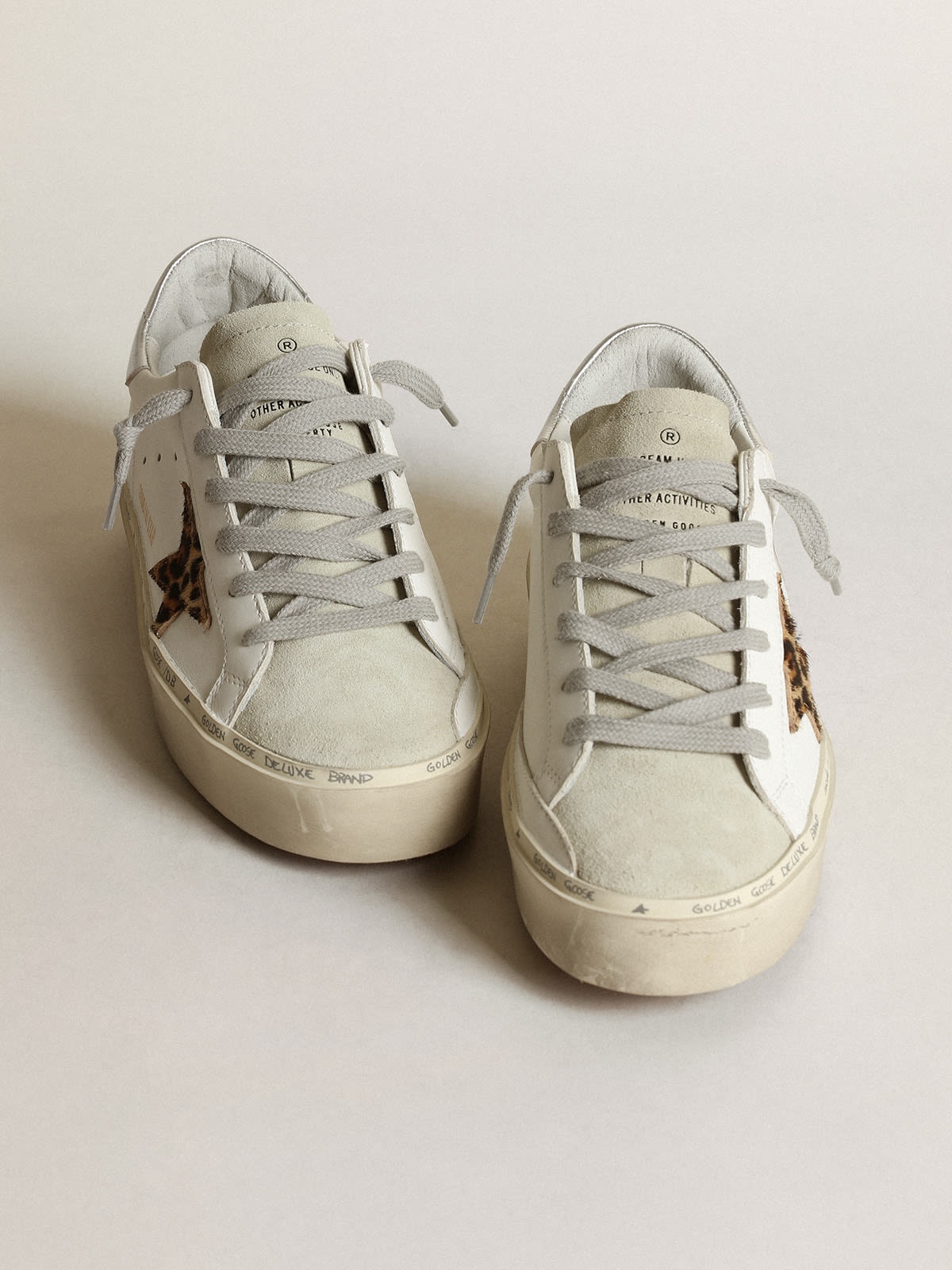 Golden Goose Hi Star sneakers with leopard-print pony skin star and silver  metallic leather heel tab | REVERSIBLE