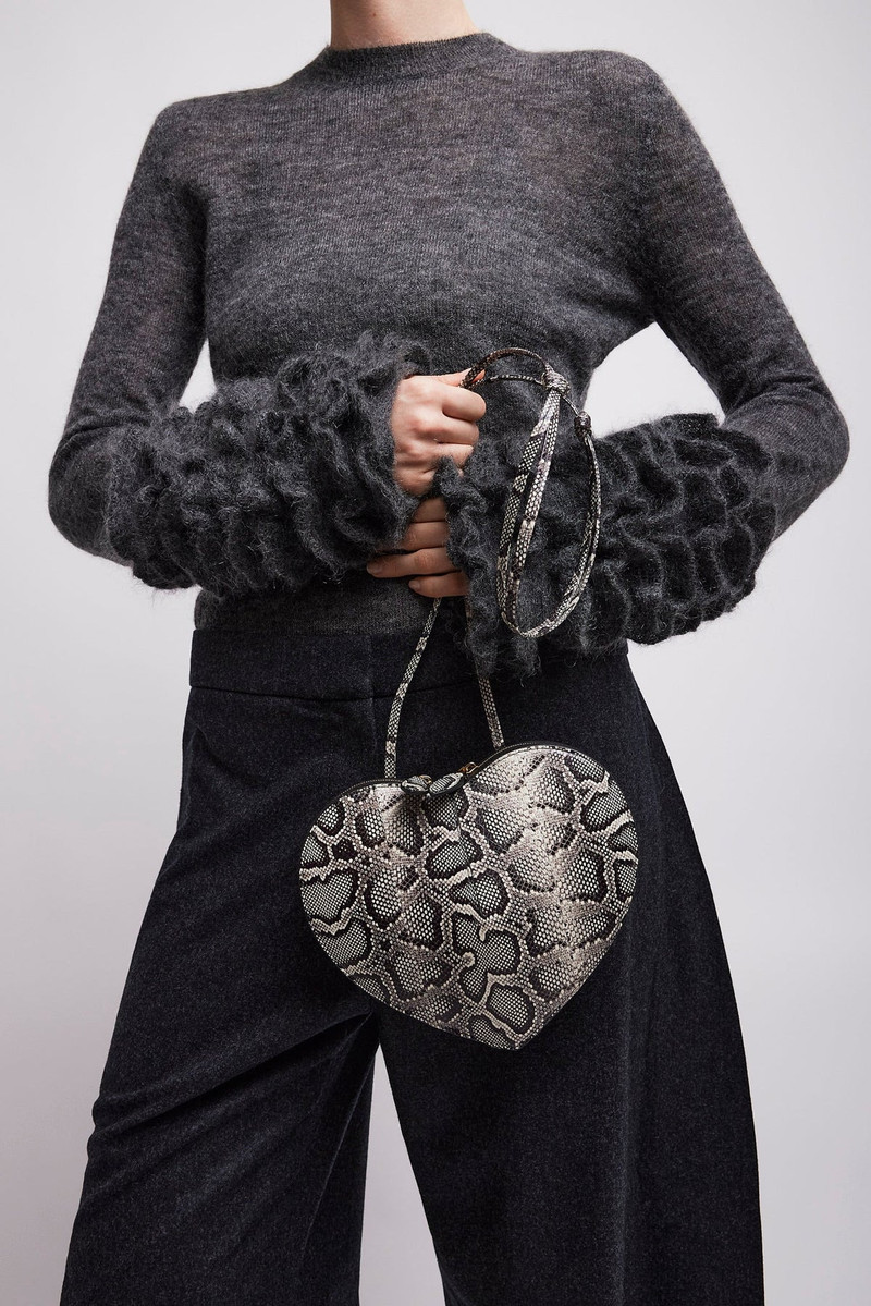 Alaïa Le Coeur black and white crossbody bag outlook