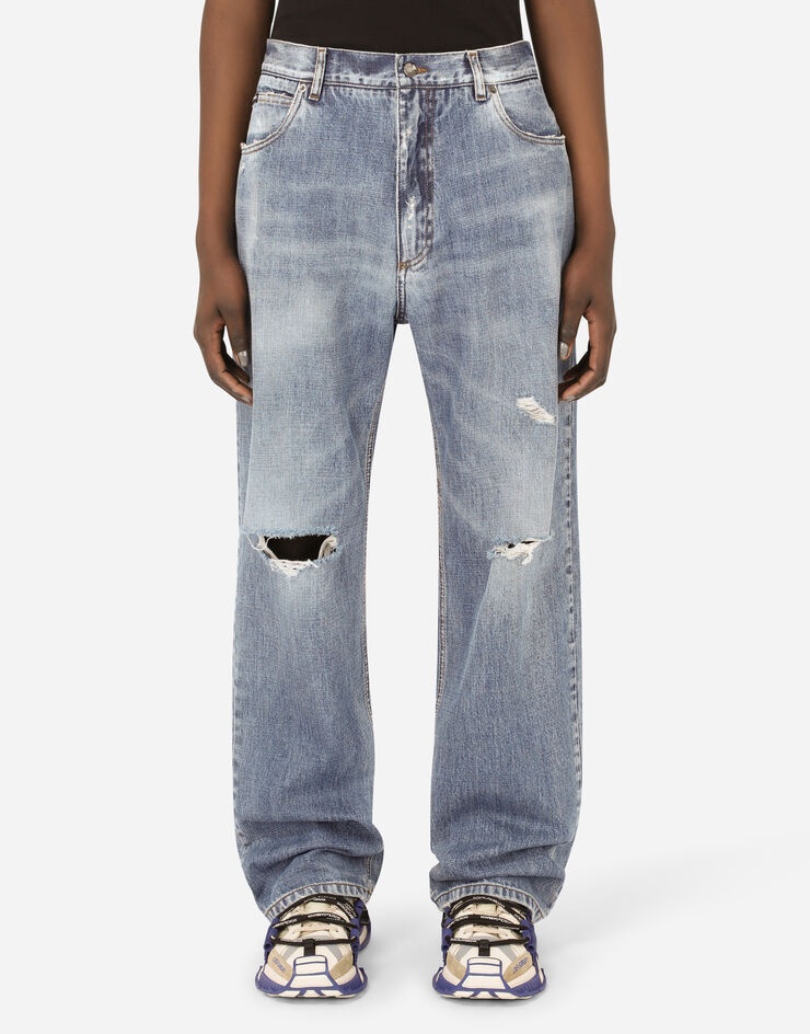 Oversize washed jeans with ripped knees - 1