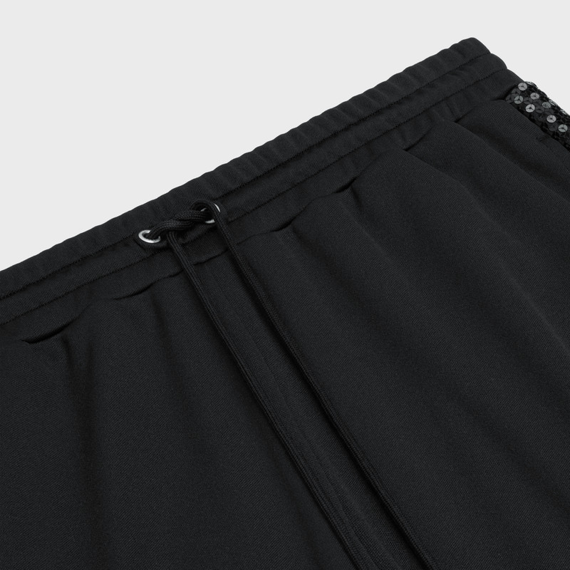 CELINE TRACK PANTS IN DOUBLE FACE JERSEY WITH EMBROIDERED BAND outlook