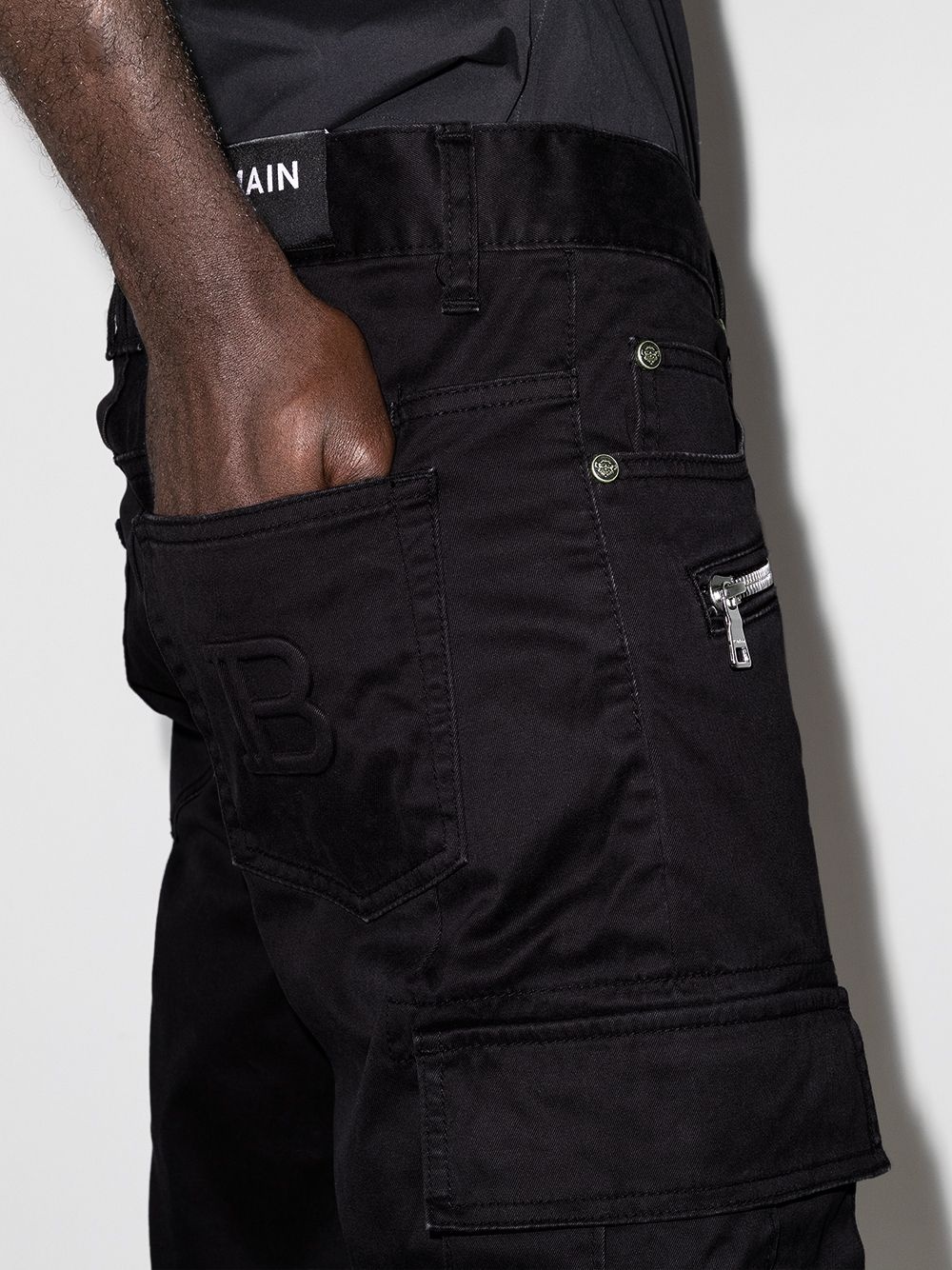 logo-embossed cargo trousers - 4