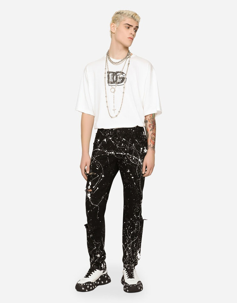 Dolce & Gabbana Skinny stretch jeans with rips and splash design outlook