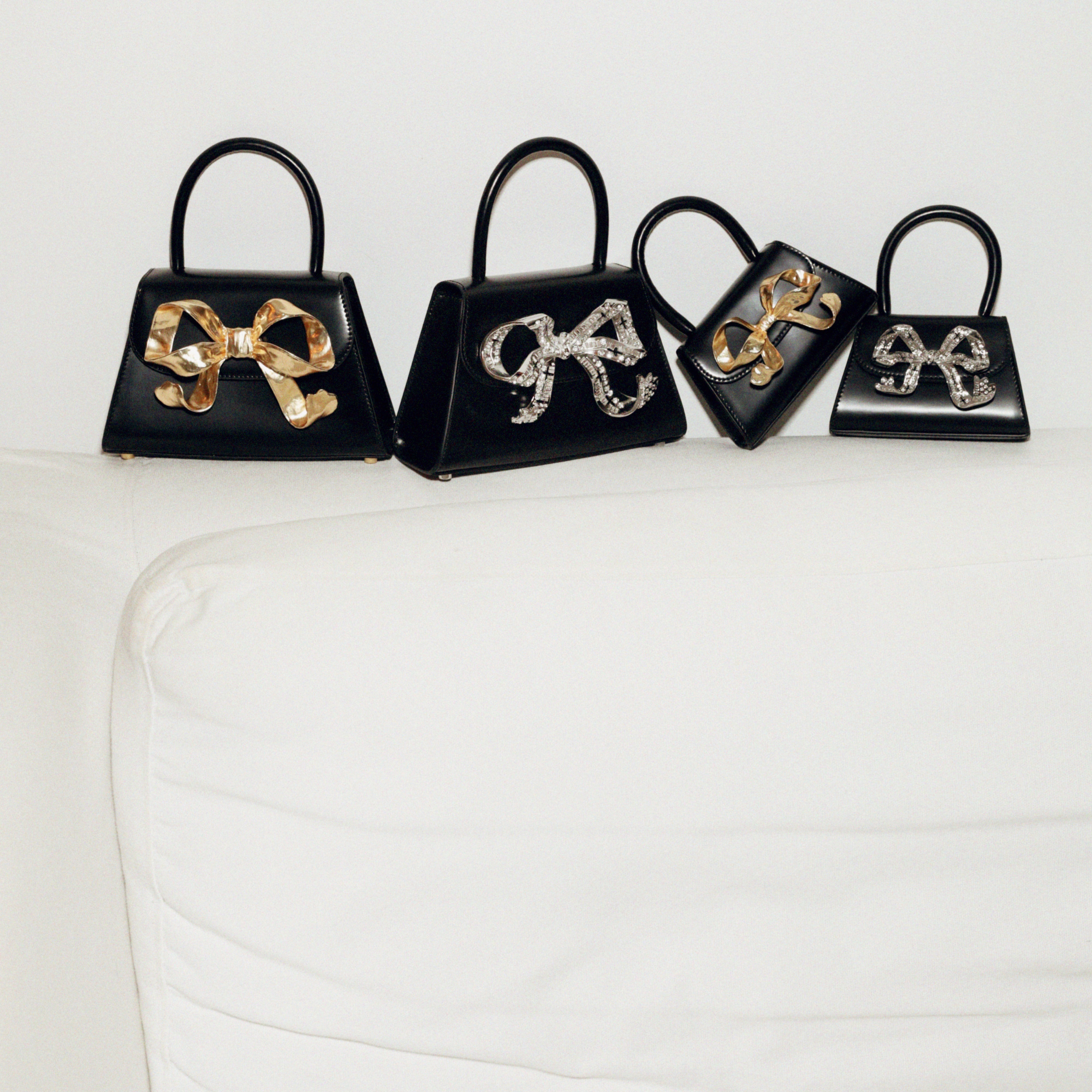 The Bow Mini in Black with Gold Hardware - 6