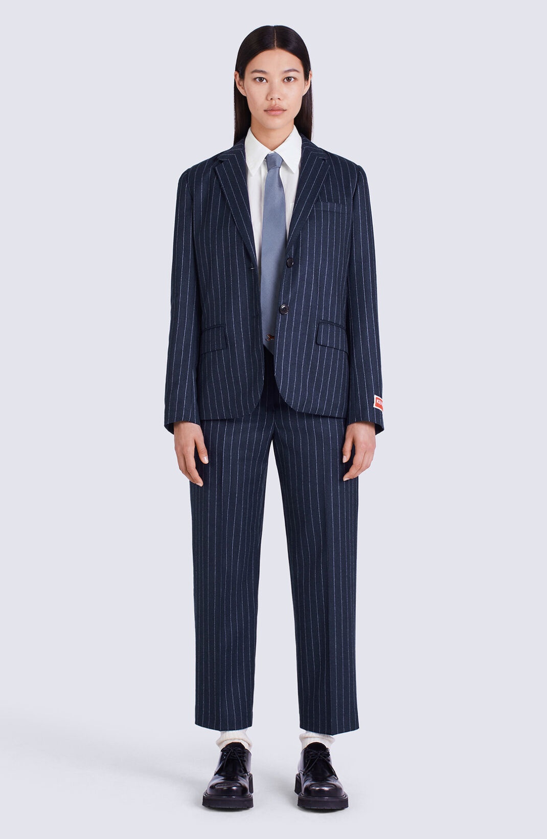 Cropped tailored striped trousers - 7