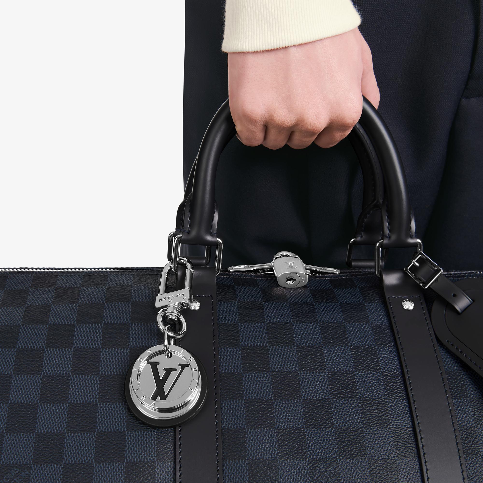 LV Cut Circle Key Holder - 2