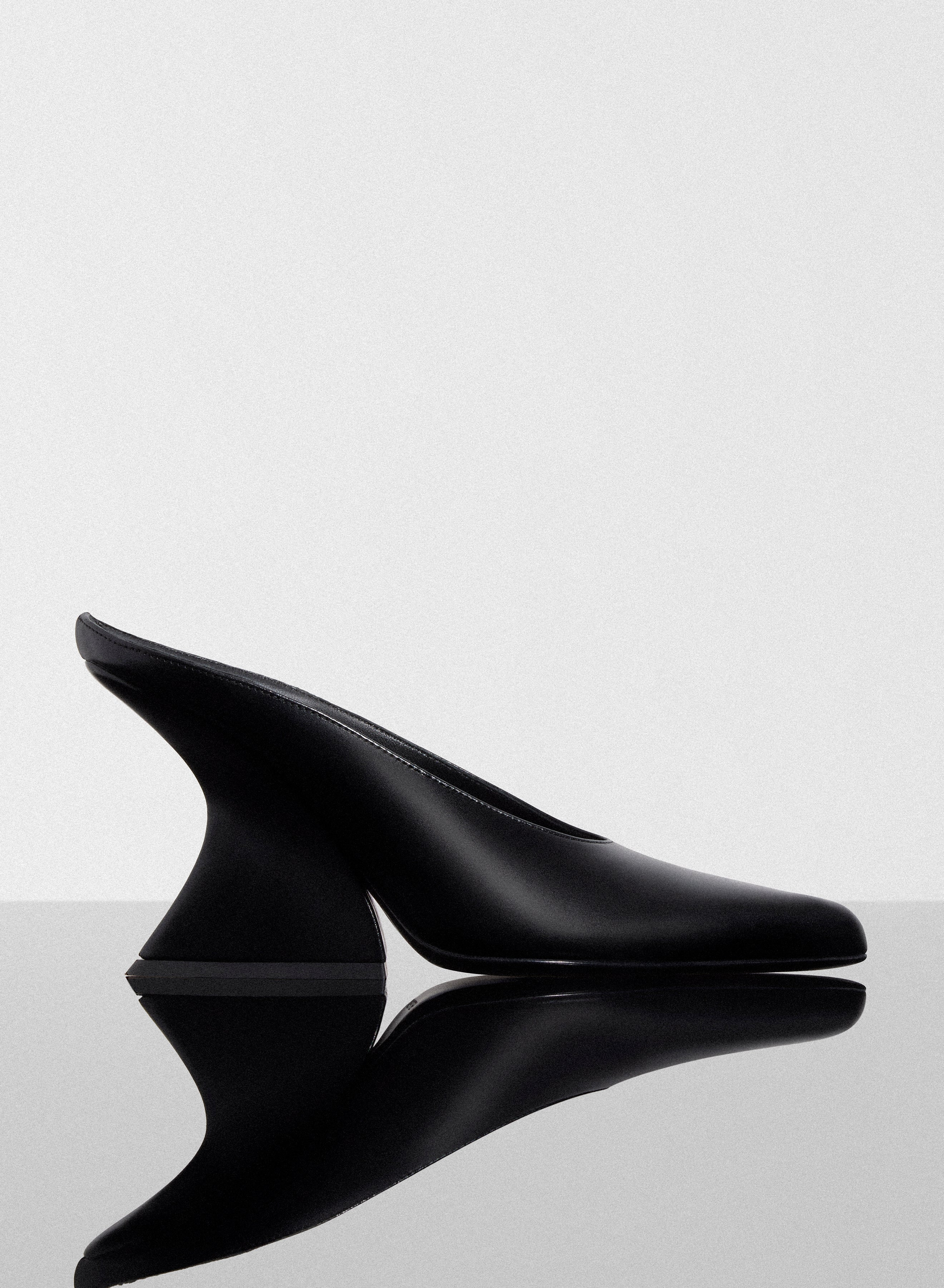black curved heel mules - 1