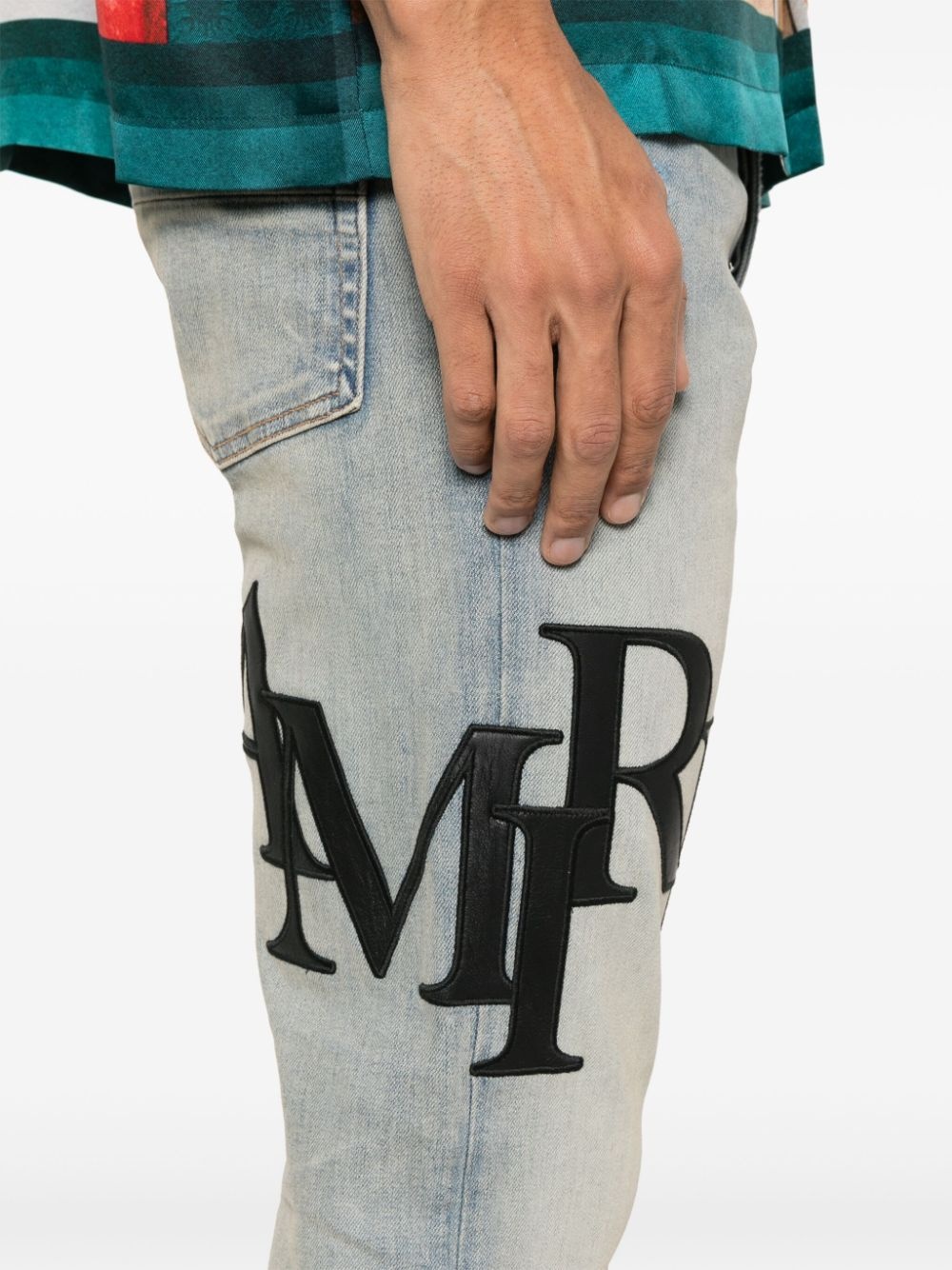 Staggered-logo jeans - 5
