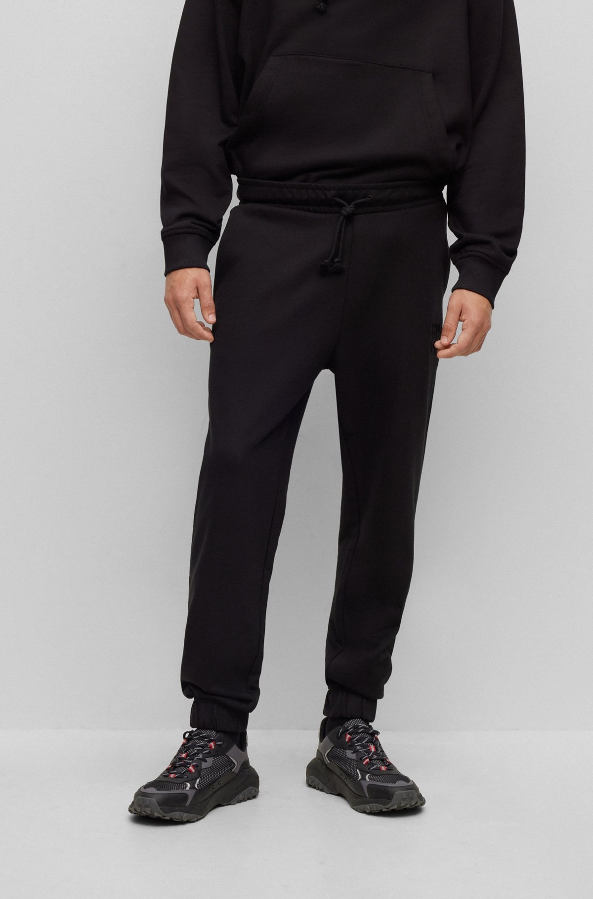 RELAXED-FIT COTTON-TERRY TRACKSUIT BOTTOMS WITH STACKED LOGO - 2
