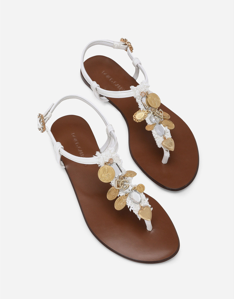 Raffia thong sandals with embroidered votive medallions 5