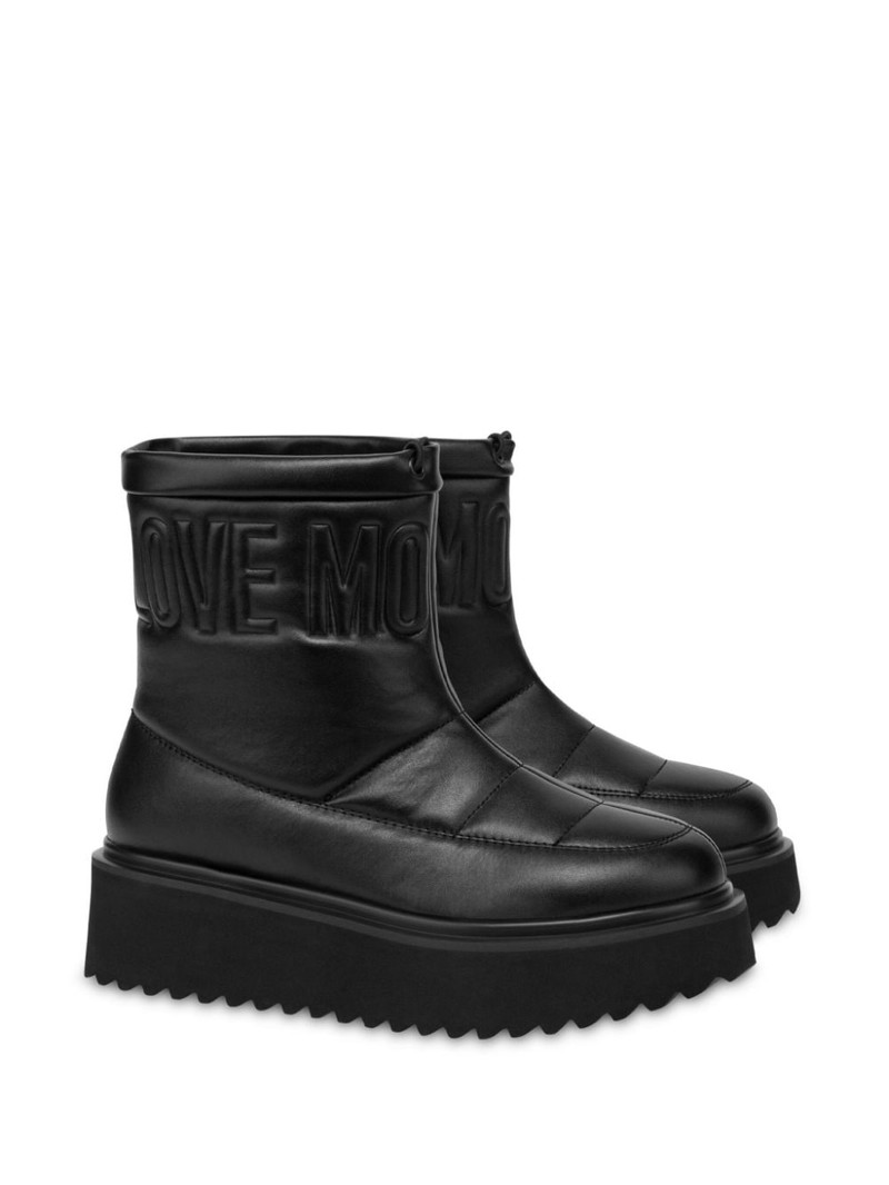 Moschino logo-embroidered flatform boots outlook