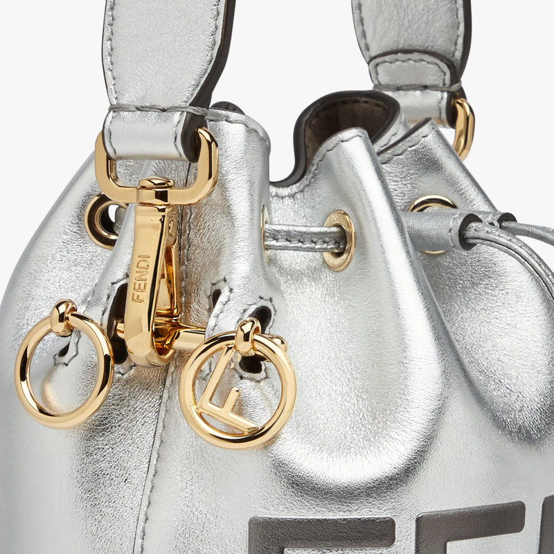 Small Mon Tresor bucket bag in silver leather, with hot-stamped graduated FENDI ROMA print. Lined in 5