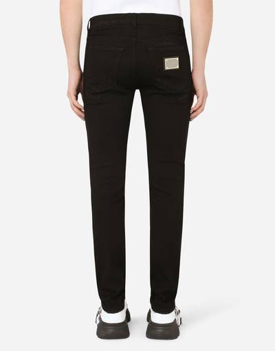 Dolce & Gabbana Black slim-fit stretch jeans with repaired rips outlook