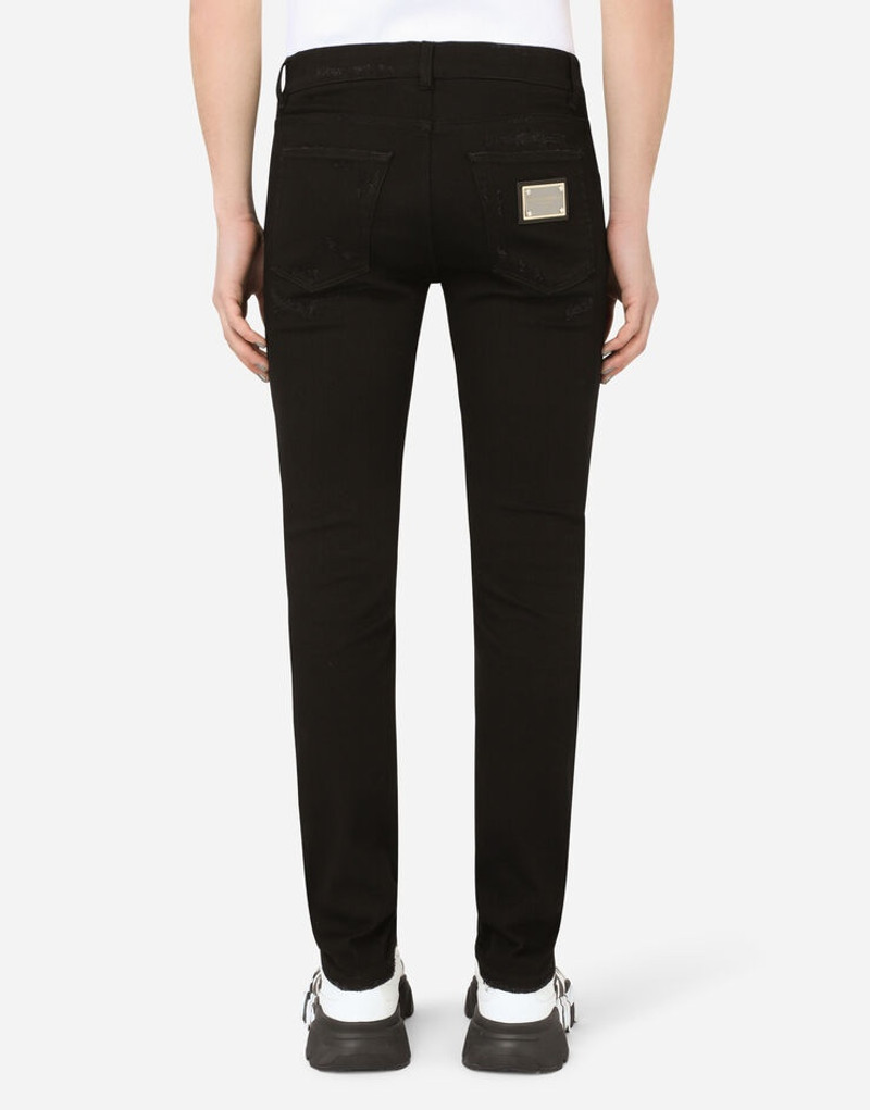 Dolce & Gabbana Black slim-fit stretch jeans with repaired rips outlook