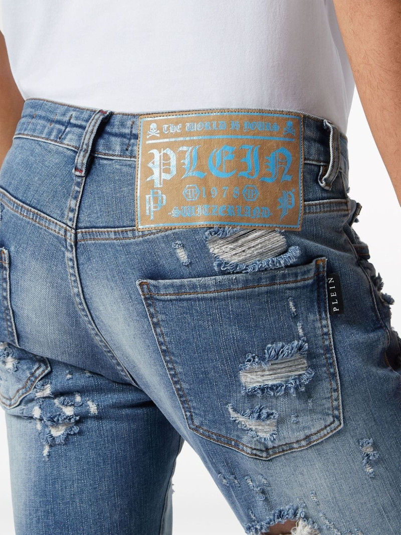 Skull-print distressed straight-leg jeans 4