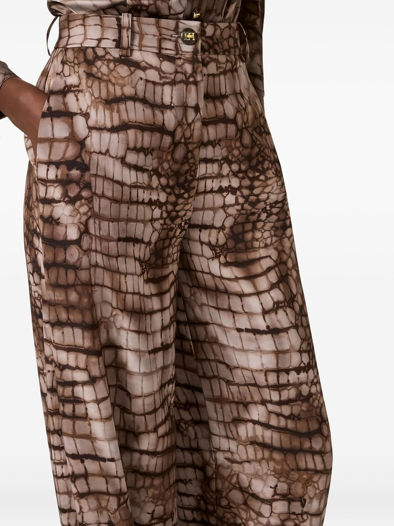 alligator-print buttoned trousers 5