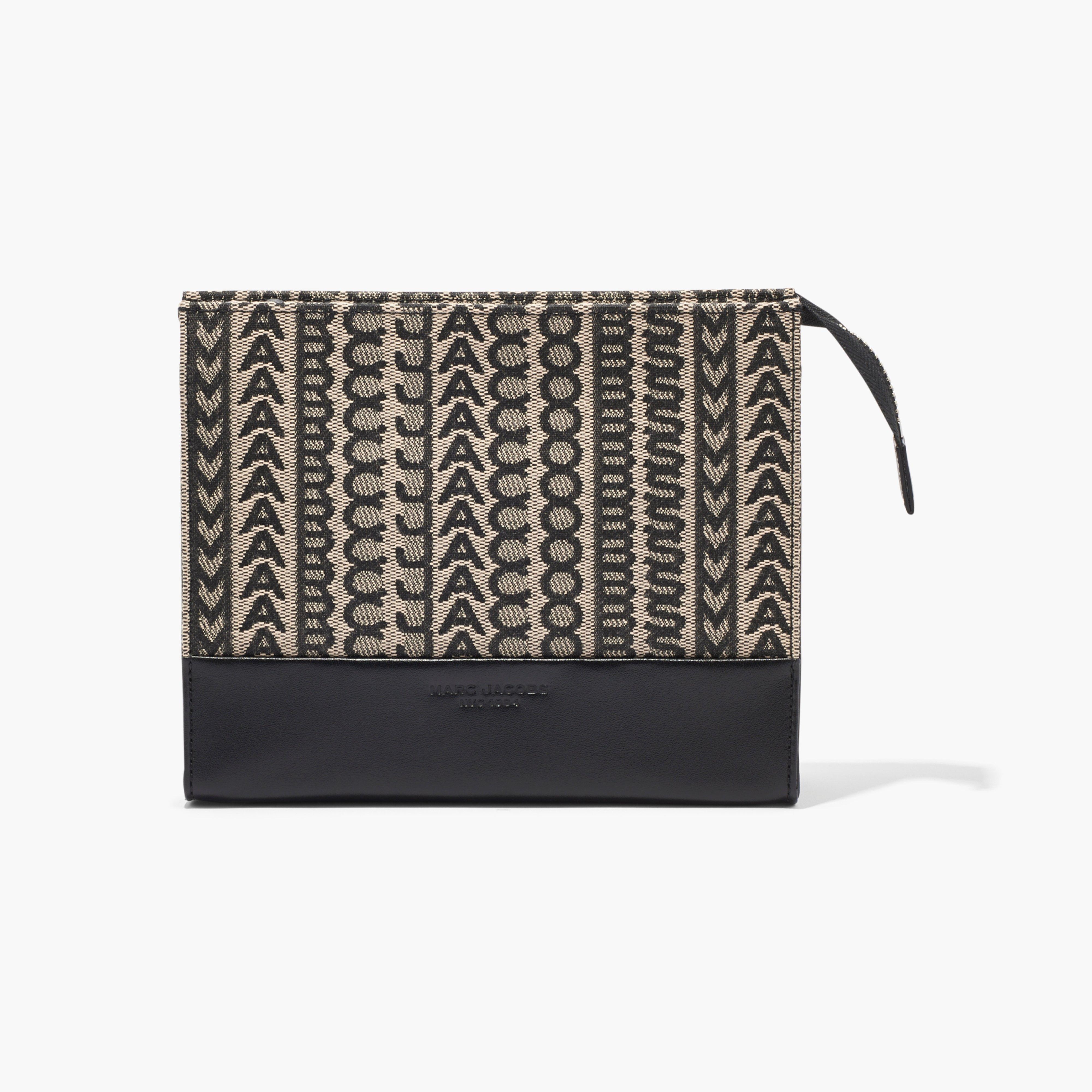 THE MONOGRAM TRAVEL POUCH - 1