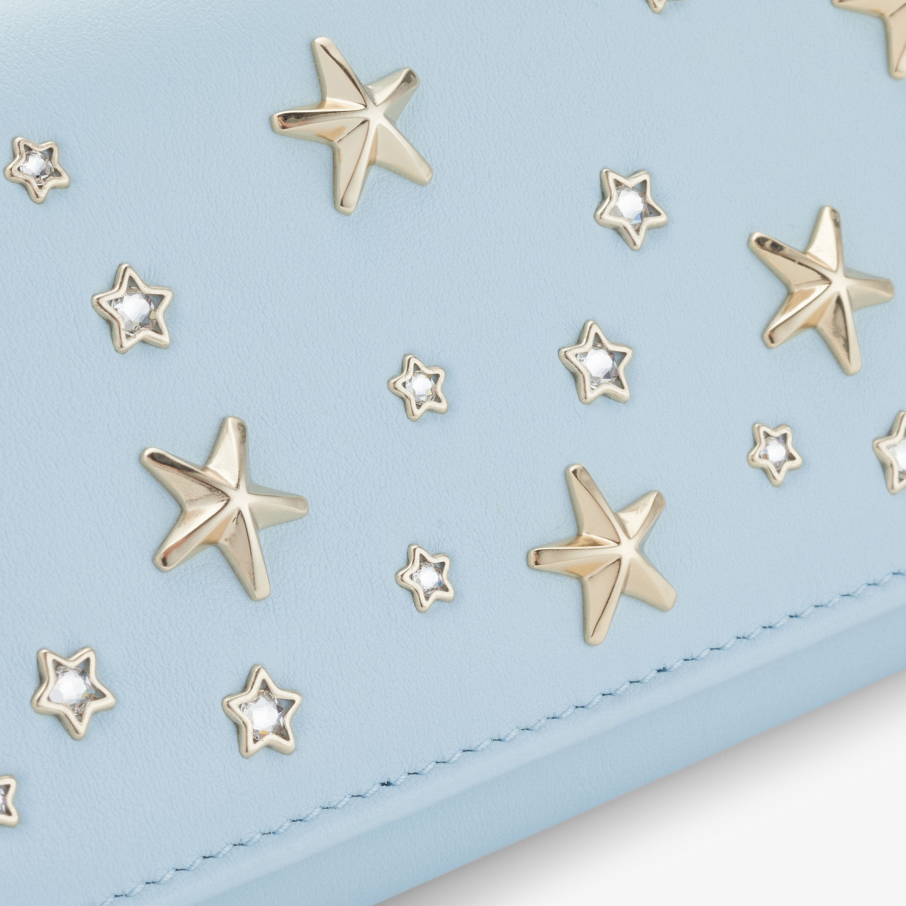 Nino
Ice Blue Calf Leather Wallet with Metal and Crystal Stars - 3