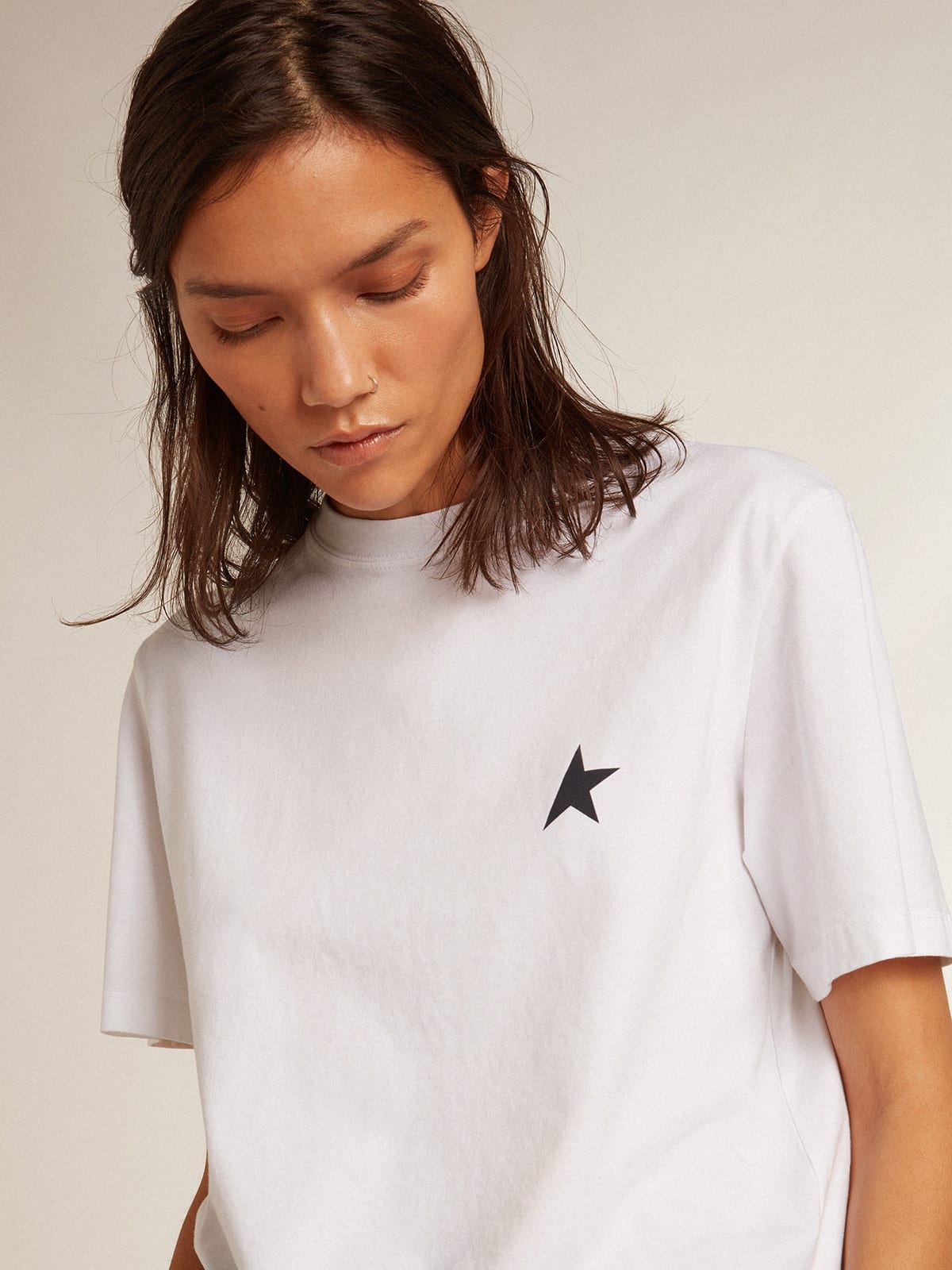 Women’s white T-shirt with dark blue star on the front - 2