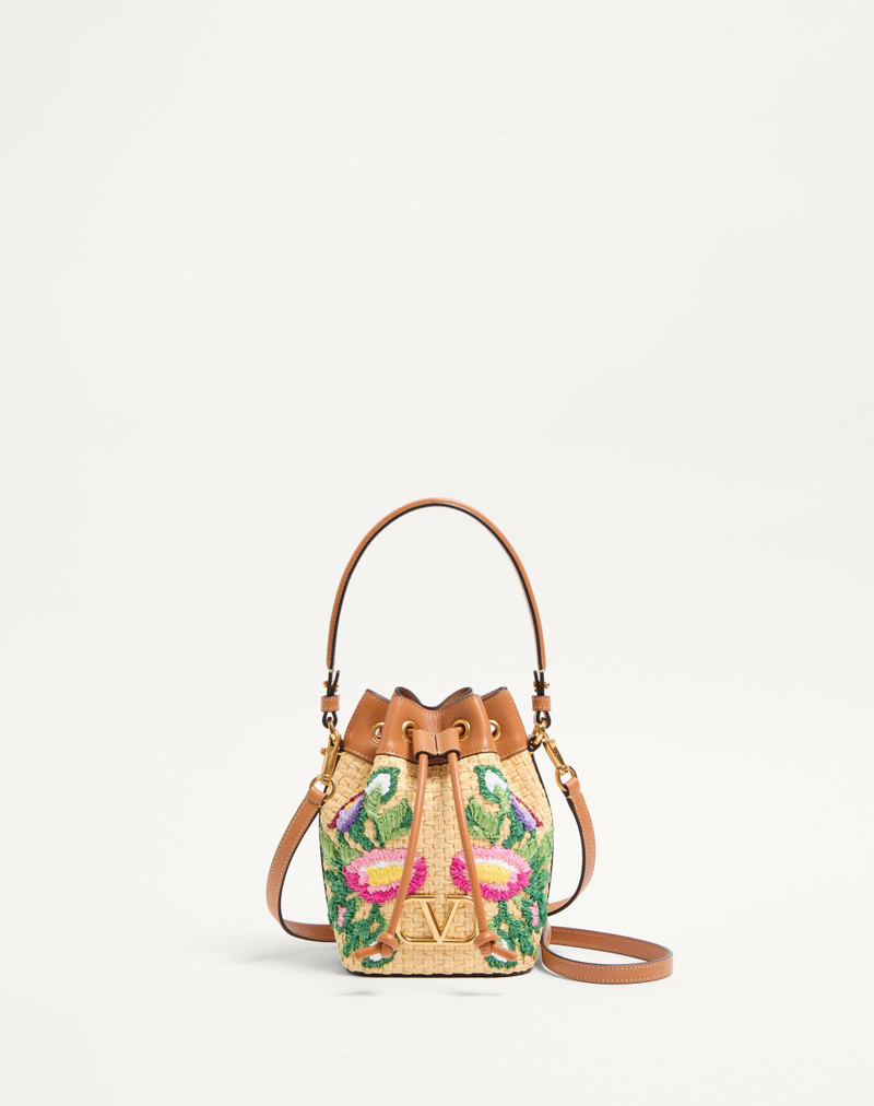 VLOGO SIGNATURE MINI BUCKET BAG IN RAFFIA WITH FLORAL EMBROIDERY 1