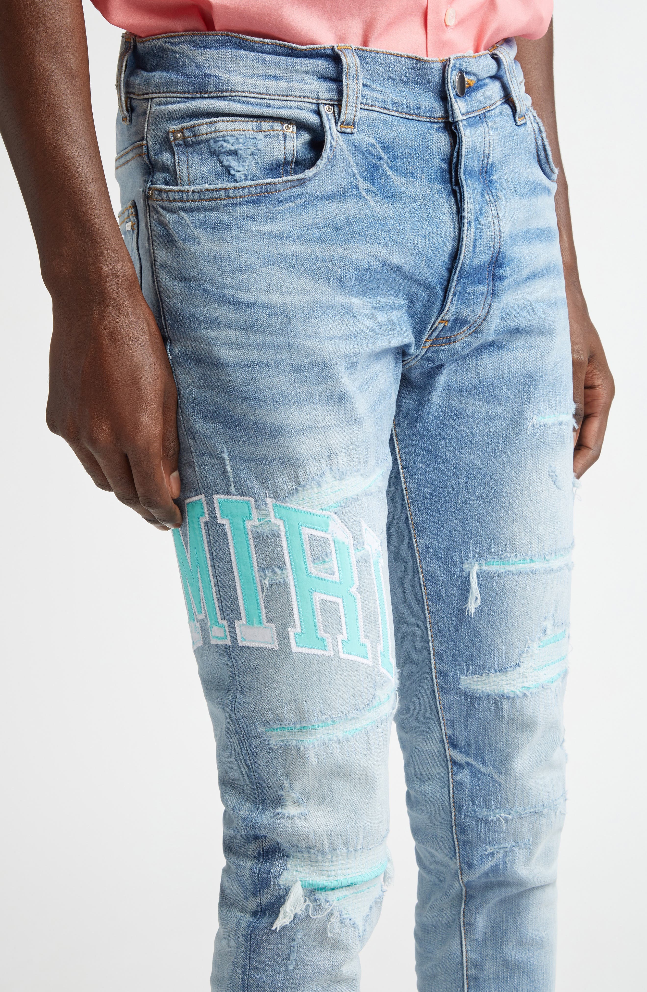 AMIRI Varsity Logo Rip & Repair Skinny Fit Jeans in Perfect Indigo at Nordstrom - 5