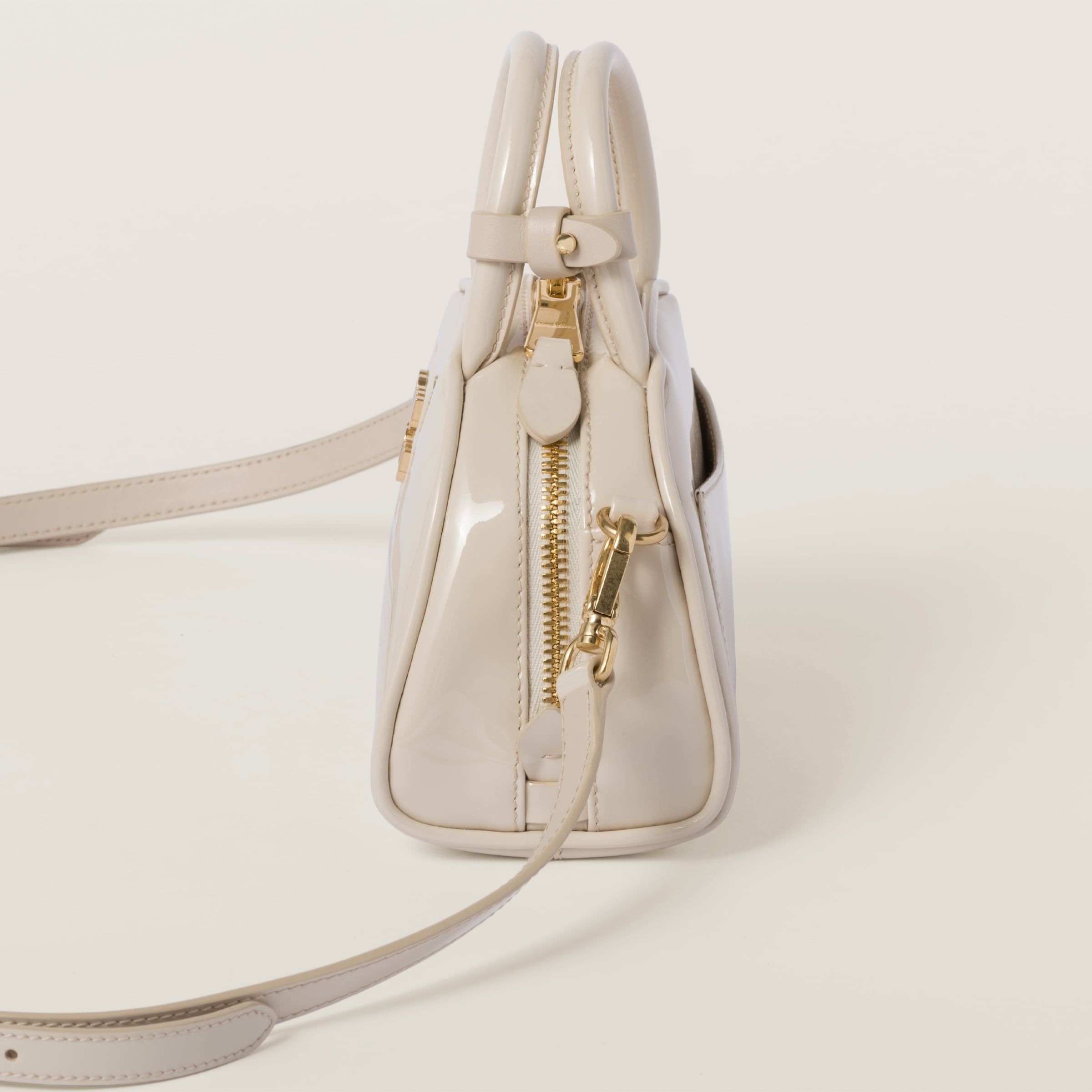 Miu Miu Patent leather top-handle bag | REVERSIBLE