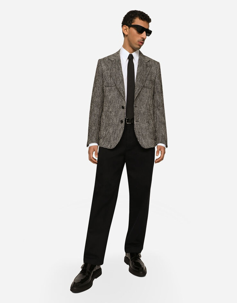 Double-breasted herringbone cotton and wool tweed jacket 5