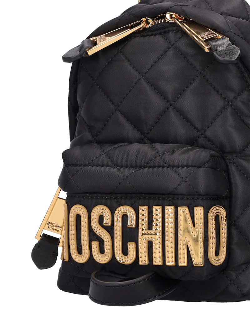 Moschino LOGO QUILTED MINI BACKPACK | luisaviaroma | REVERSIBLE