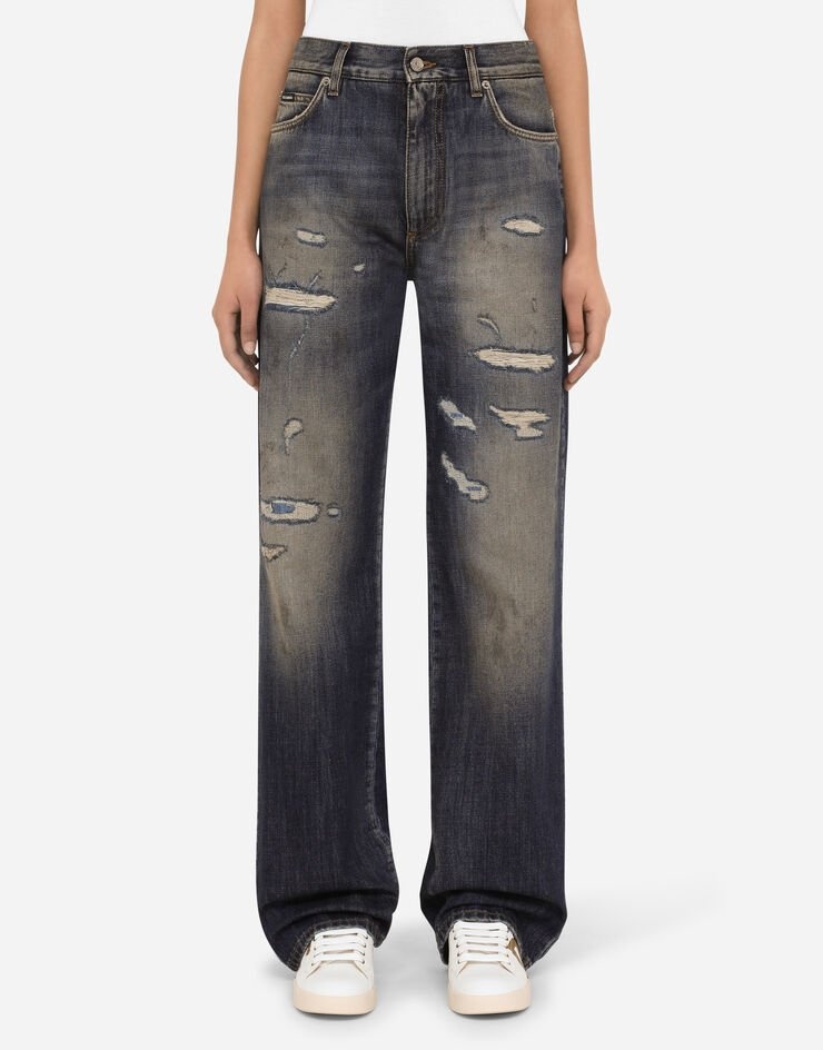 Flared jeans with ripped details - 2