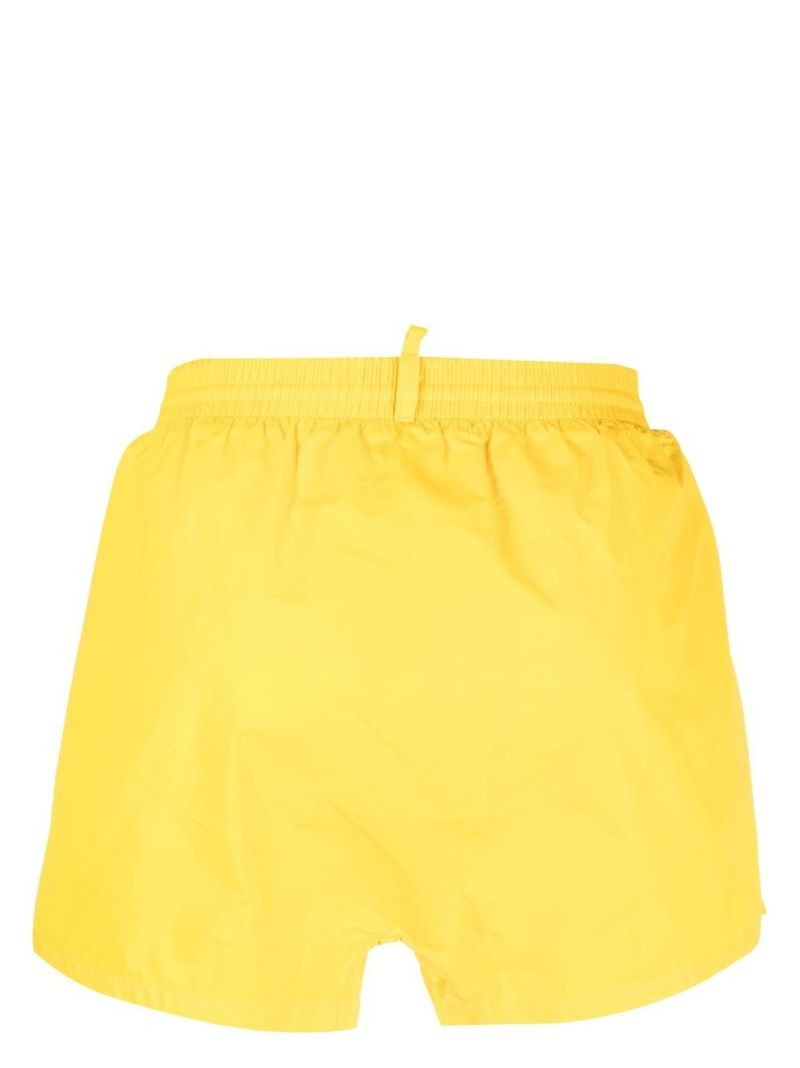 DSQUARED2 logo-print swim shorts outlook