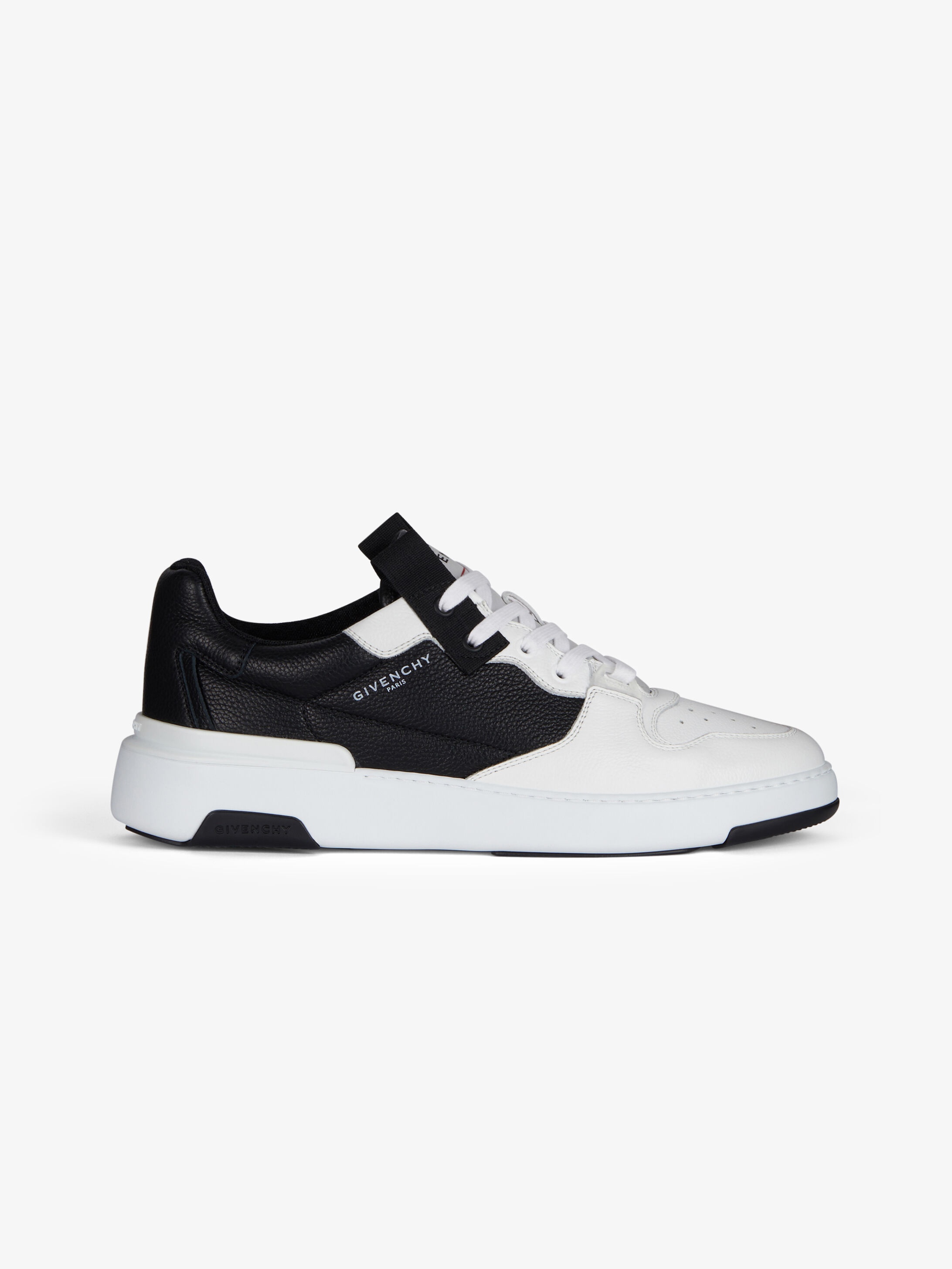 Wing low asymmetric sneakers in leather - 1