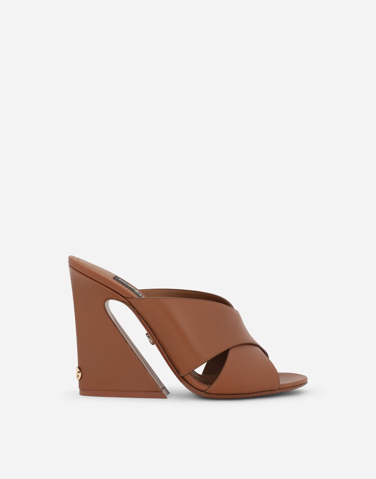 Calfskin mules with geometric heel - 1