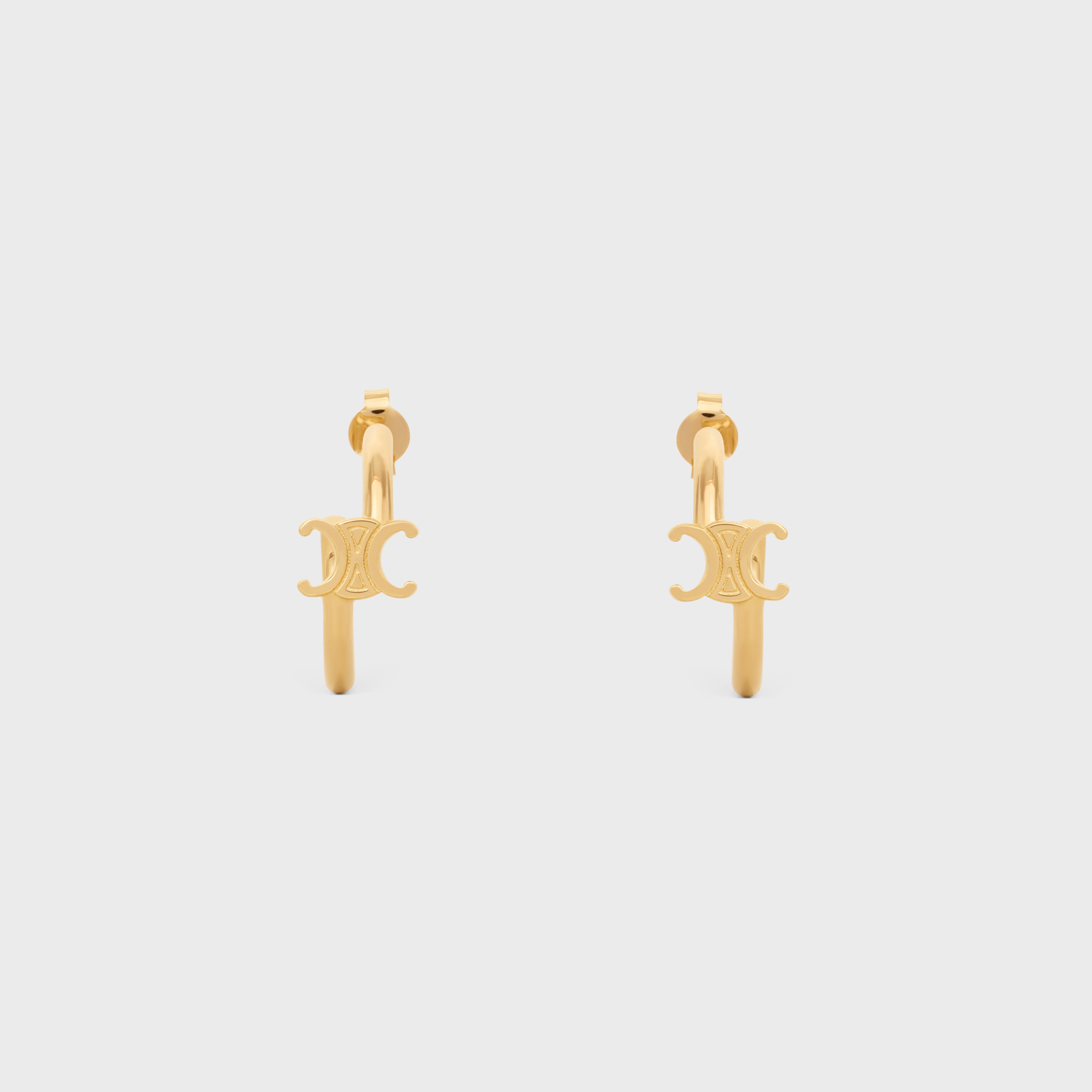 【国内発送】TRIOMPHE ASYMMETRIC HOOPS IN BRASS CELINE Triomphe Asymmetric Hoops in Brass with Gold Finish