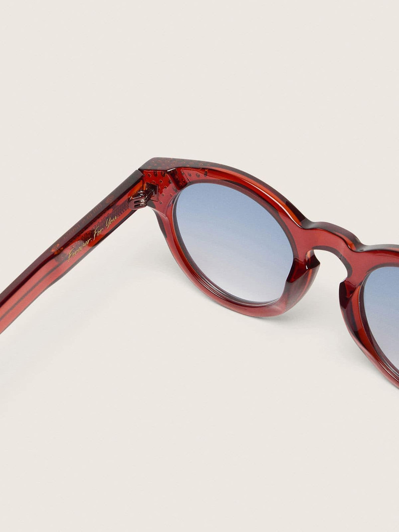 Cameron Panthos sunglasses with honey frame, precious stones and blue lenses 3