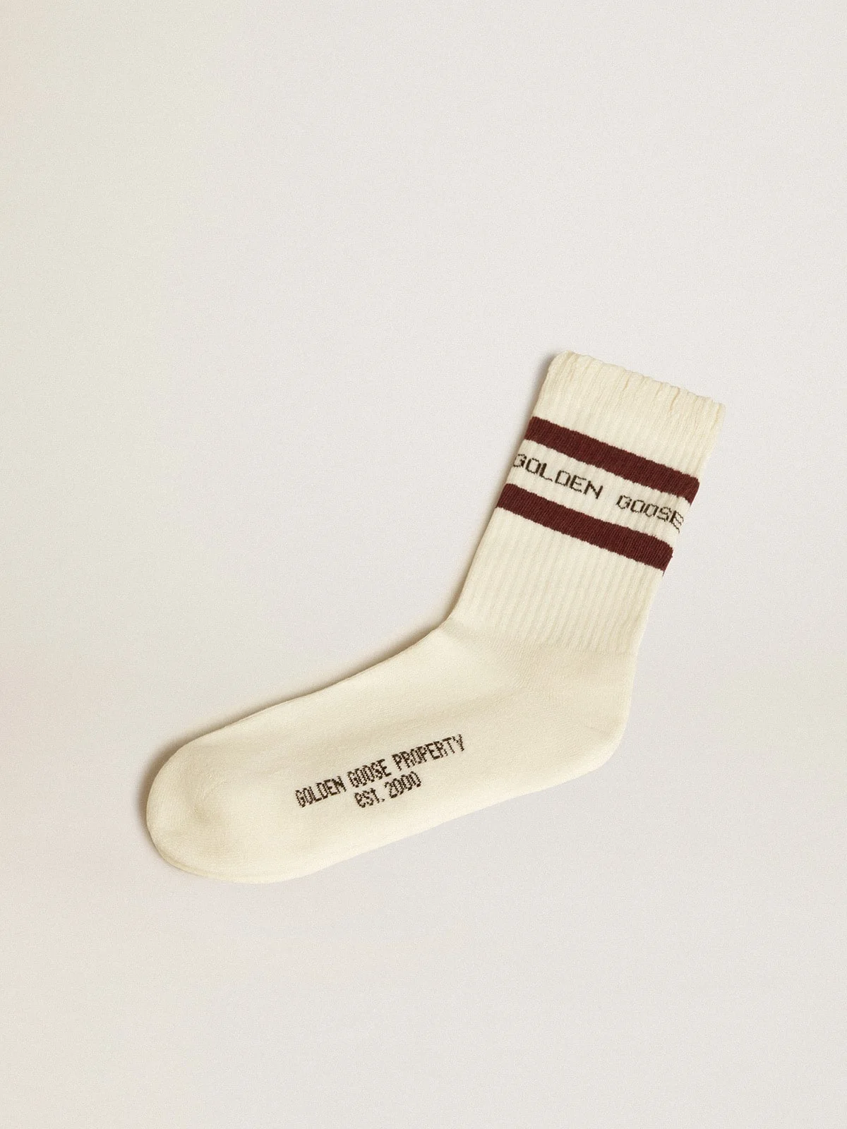 Worn-white socks with distressed details and brown stripes - 1