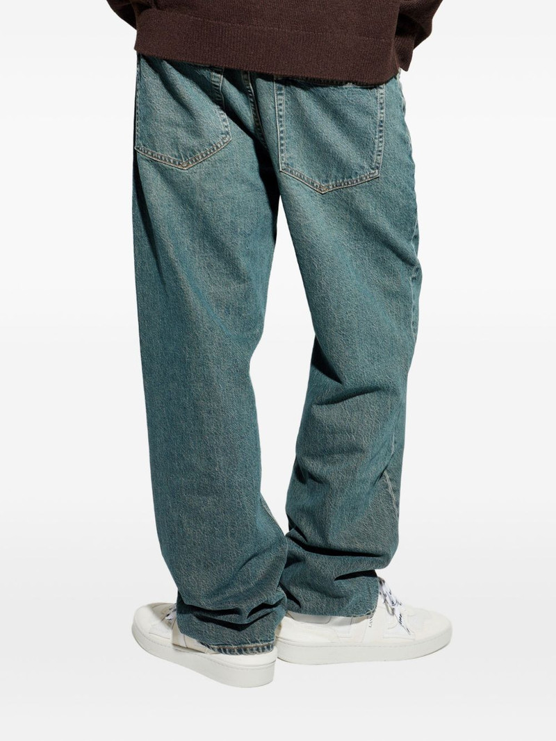 Saeddie button-fastening jeans 4
